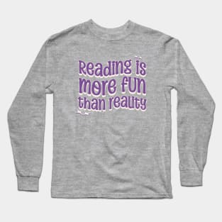 READING IS MORE FUN THAN REALITY - Purple Text Long Sleeve T-Shirt